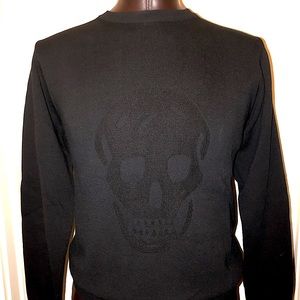 Alexander McQueen sweater w/ skull detail.